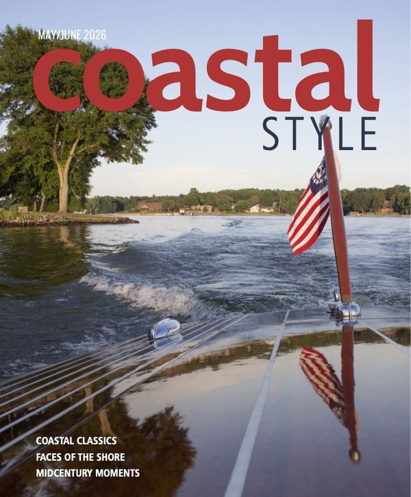Coastal Style May/Jun 2026 cover: the wake behind a classic wooden boat flying a flag.